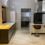 Real installed modular kitchen with wood countertop